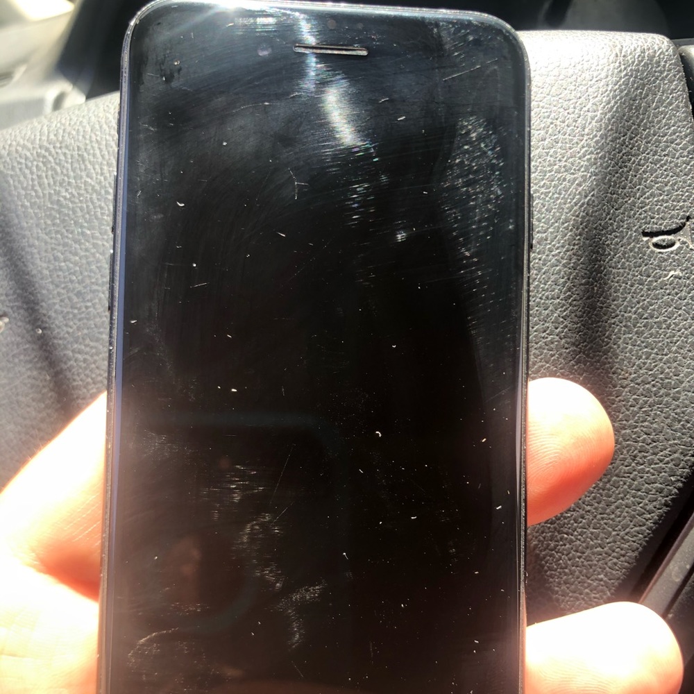 iPhone does not power on. Great for parts.